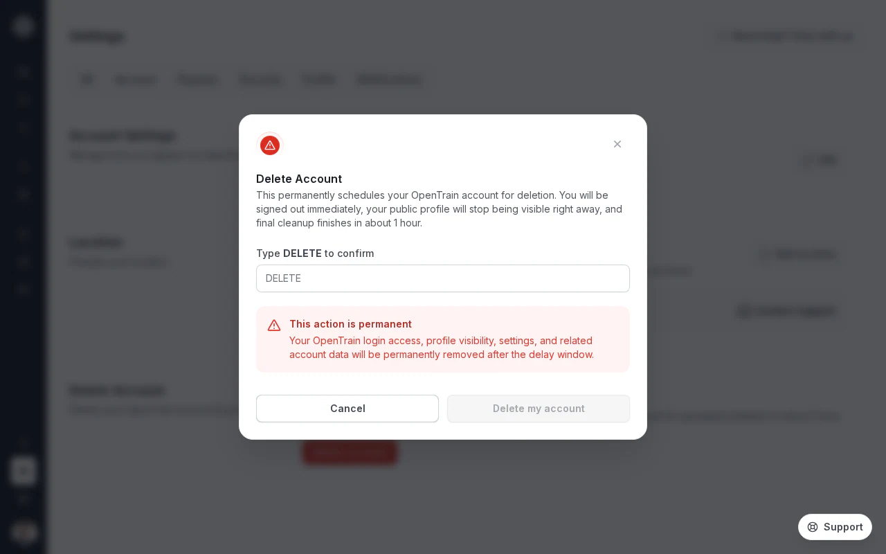 DELETE 確認フィールドと、無効化された「アカウントを削除」ボタンがある OpenTrain AI のアカウント削除確認ダイアログのスクリーンショット。